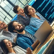 Software developers collaborating